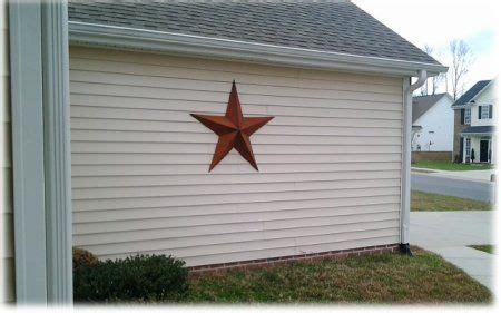 metal star on side of house|barn stars outside of house.